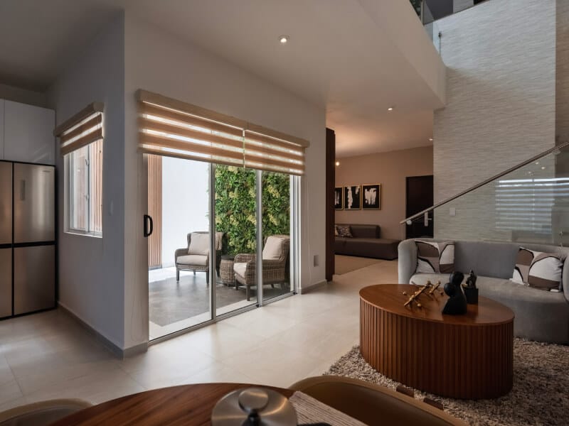 Vista del patio desde el interior del modelo Arezzo en el fraccionamiento Xandora Residencial de la inmobiliaria Javer