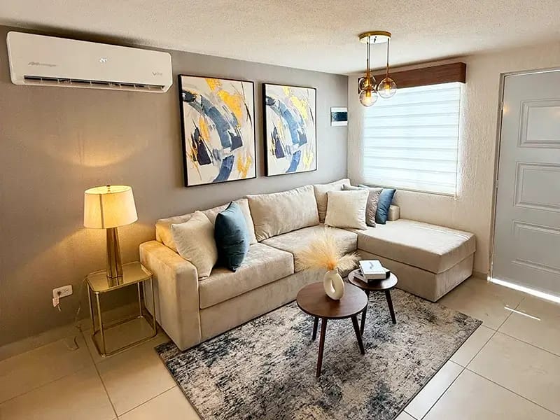 Sala del modelo Águila Premier en el fraccionamiento Privada Monte Carmelo que pertenece a la inmobiliaria Javer