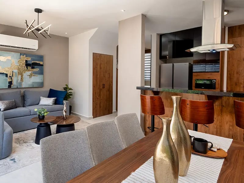 Sala con Comedor y cocina en el modelo Aura Elite 3N del fraccionamiento Bosques de la Sierra en inmobiliaria Javer de Nuevo León