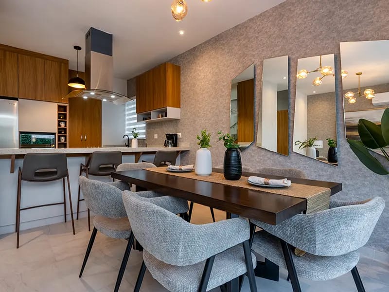Comedor y cocina en el modelo Aura Elite 2N del fraccionamiento Bosques de la Sierra en inmobiliaria Javer de Nuevo León